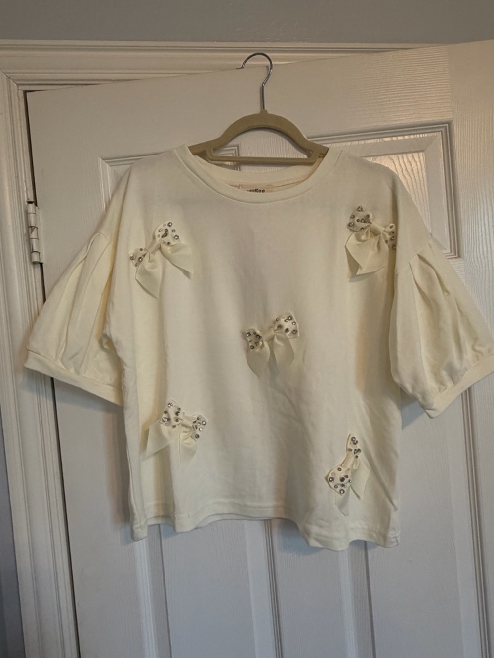 Umgee Cream Bow-Accent Short Sleeve Top